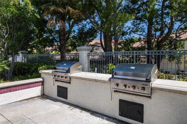 Community barbecues located in pool area