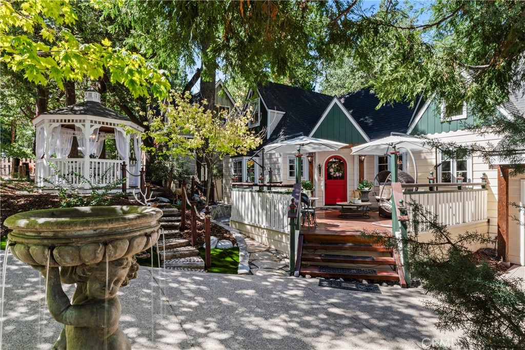 Welcome to this Magical Quintessential Fairytale Cottage Located Lake side in the Palisades area of Lake Arrowhead! A One of a Kind Vintage (circa 1943) Home Restored to Perfection. Absolutely Charming! From the Inviting Front Entry Dutch Door to the Intricate Details in Every Corner.  Custom Features Include Open Beamed Ceilings, Tongue & Groove Paneling, Curated Light Fixtures, Custom Cabinetry, an Antique Built In Closet, a Cast Iron Soaking Tub, Dual Pane Jeld Wen Wooden Crank Windows with Retractable Screens, Glazed Porcelain Tiles, Marble Kitchen Counter top, Custom Cabinetry, an Authentic 1950 Wedgewood Stove, Beautiful Oak Wood Flooring, Sky lights, Air Conditioning, Immense Storage, and a very Flexible and Sensible Floor Plan. Situated on a Completely Level and Amazingly Well Landscaped Parcel with Meandering Stone Walk Ways, a Picket Fence, an Amish Gazebo, a beautiful Cherib Fountain and even a "She Shed" that could even become an Artist Studio. This Is Simply One of the Most Romantic and Well Priced Homes of the Year! She Won't Last!