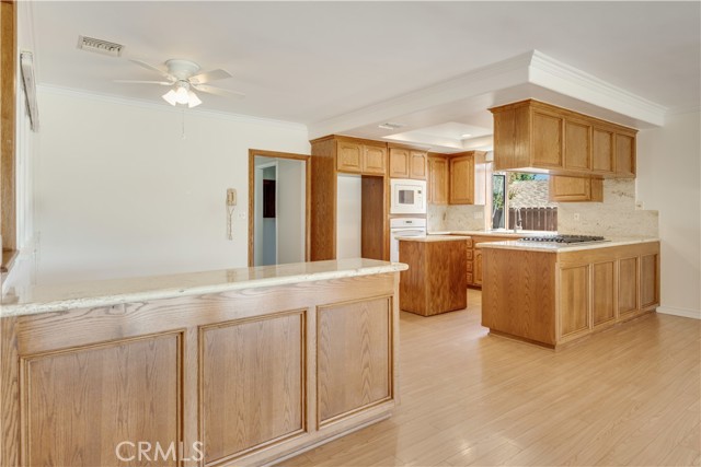 Kitchen has a sunny breakfast room.