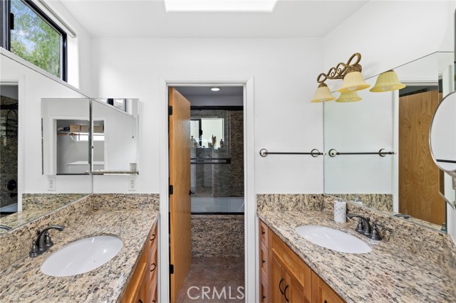 338 Y - Walk-in closets and chic baths with dual sinks.