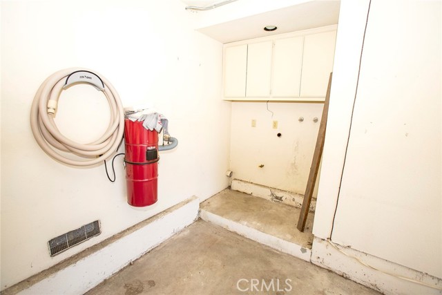 2-Car, direct access garage, built-in vacuum system & full size hook-ups for Washer & Dryer