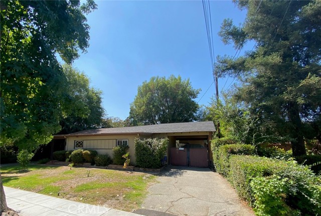 North driveway leads to single garage attached to Studio