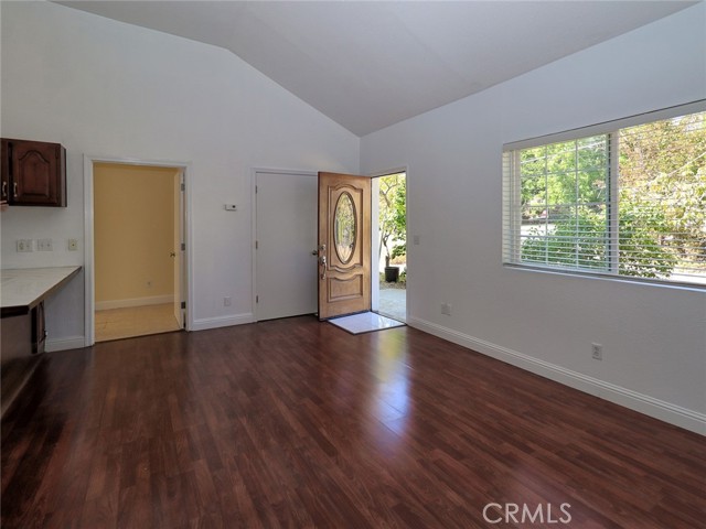 Front entrance, Door to Utility room/storage, Entrance to Master Bedroom, Breakfast Bar to the left.