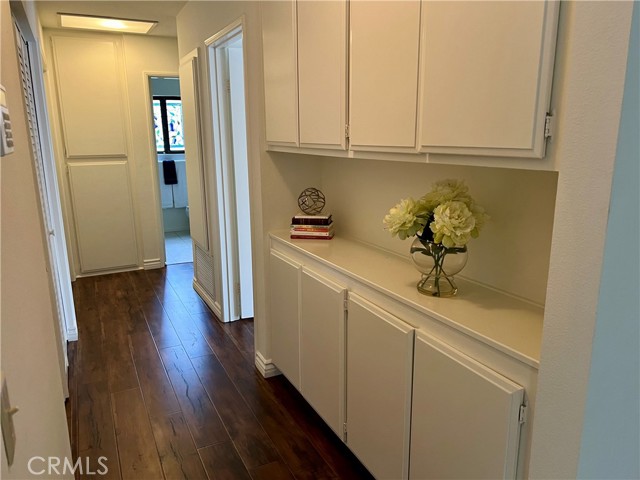 Hall way with lots of cabinets