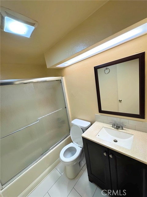 Adjacent to the 2nd bedroom is the tastefully updated guest restroom.