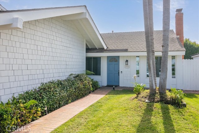 Freshly Painted Exterior with Blue Door