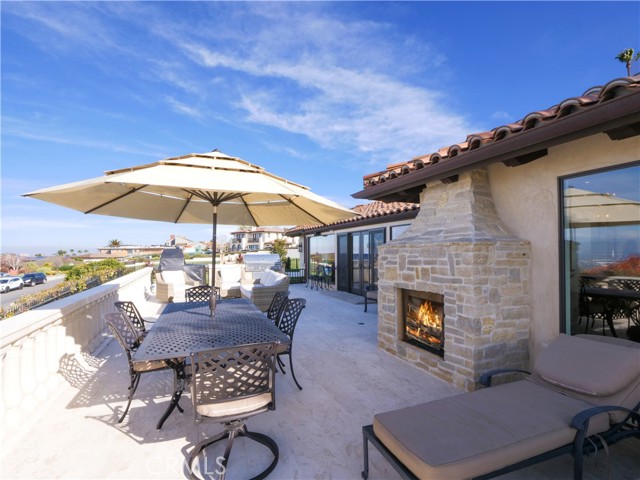 Outdoor fireplace on front patio