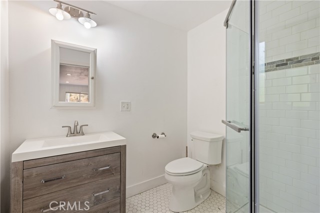 Bathroom with shower in one bedroom apartment