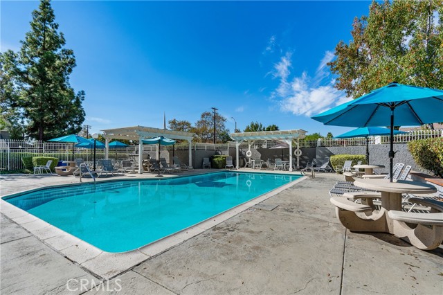 Sparkling Community Pool and Sitting Areas