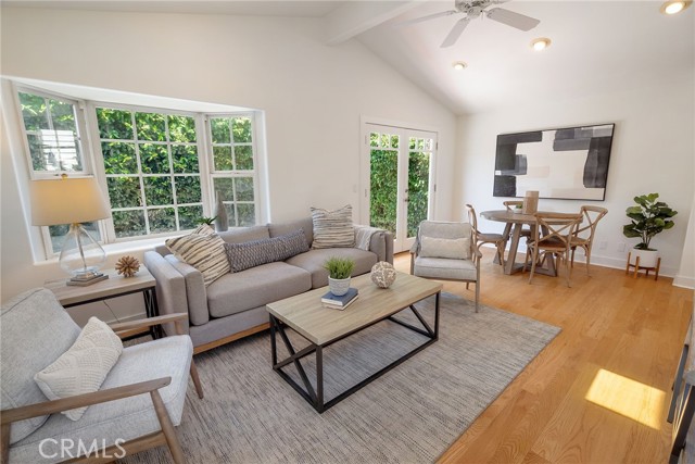 This light filled family room and dining area leads to outside.