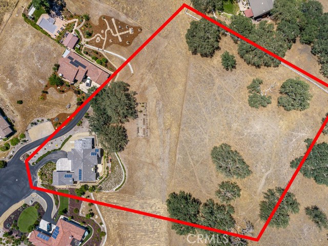  Rough approximation of lot lines - parallels driveway on left, is inside of white fence at top of photo and inside of line at bottom of screen (where grading pattern changes).