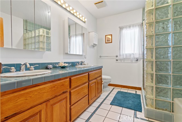 Primary bathroom with double sinks.