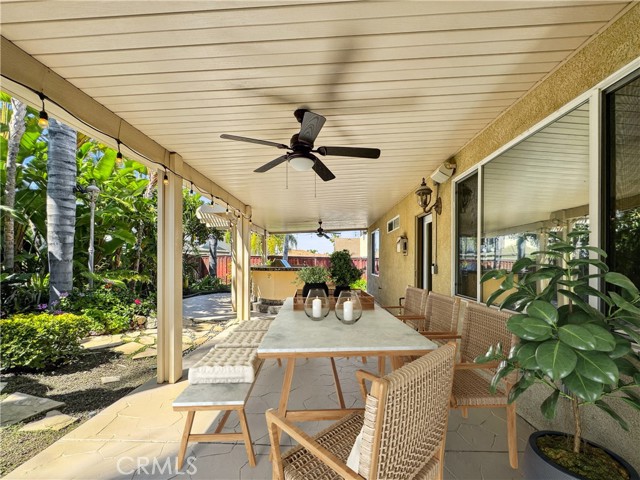 Rear outdoor living area space.Photos depict virtual staging and are not representative of current furnishings in the home.