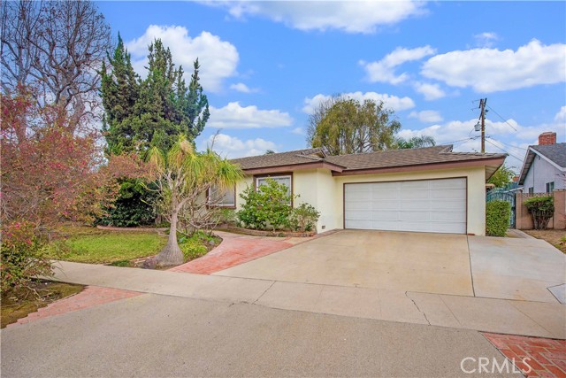 Welcome to 11381 Park Ln, a charming home nestled in a peaceful cul-de-sac in Garden Grove! This spacious 4-bedroom, 2-bathroom home offers 1,971 square feet of living space on a generous 8,240 square foot lot, providing plenty of room to create your dream home. Built in 1960, this property is ready for your personal touch and updates, offering incredible potential at an unbeatable price.  Step inside to discover a bright and inviting layout, complete with two cozy fireplaces – one in the living room and one in the family room – perfect for relaxing and entertaining. The home also features an inside laundry room for convenience and a 2-car garage for ample parking and storage.  Located close to excellent schools, parks, and shopping, this home offers the perfect blend of quiet suburban living and easy access to everyday amenities. Don’t miss this fantastic opportunity to make this home your own!