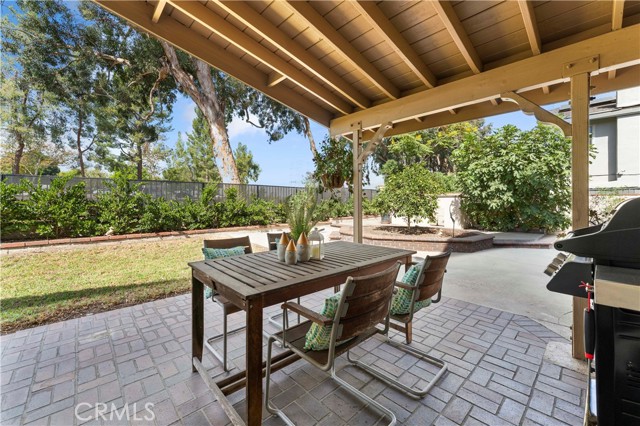 Covered patio area from double slider set off from family room.