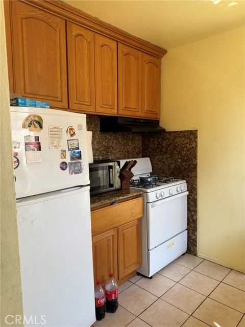 1229 E 89th Street, Los Angeles CA: https://media.crmls.org/medias/7518094e-400c-4874-9642-ef5f7e9586a4.jpg