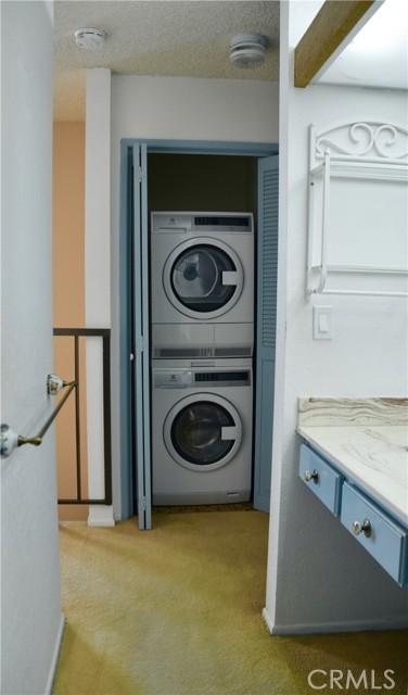 Stacking washer and dryer is two years old .