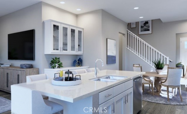 * REPRESENTATIVE PHOTO. This chic kitchen flows right into the dining area.