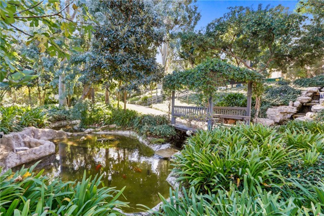 Enjoy a walk in the lush zen grounds with Koi Pod & babbling brooks flowing throughout