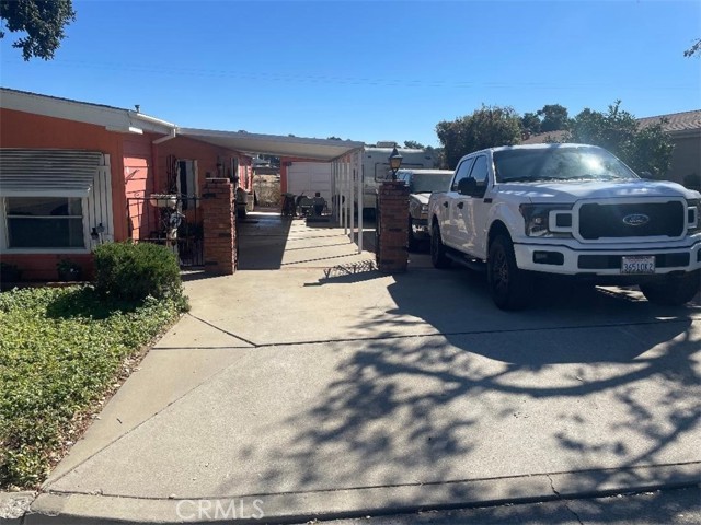 Six vehicles fit in driveway.