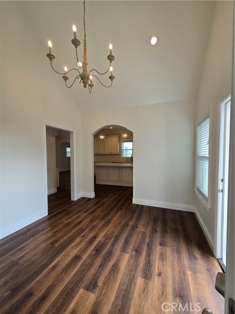 Vaulted ceiling in the formal dining room with access to the patio and yard.