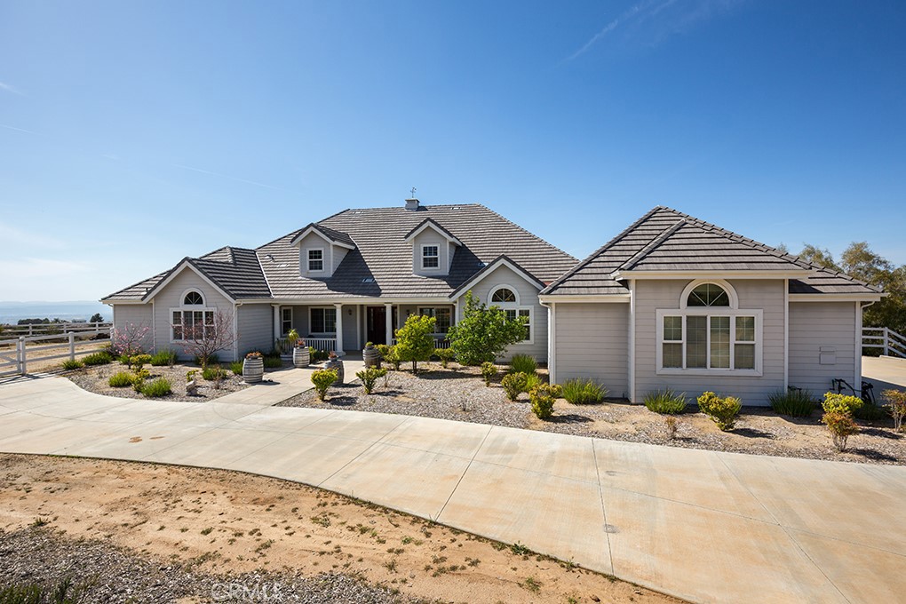 40267 Scanlon Road Temecula, California Custom Built Single Story home in Wine Country with INCREDIBLE VIEWS! First time on the market!! Original owners have built this home from the ground up! This house has all the bells and whistles. SUPER LOW ASSESSMENTS! THE WATER BOND HAS BEEN PAID IN FULL! This home boasts 4 bedrooms, 3 1/2 bathrooms, Formal Living room and Dining Room, and a separate office that can easily be converted to a bedroom. In addition the Master Suite, there are 3 additional bedrooms, 1 that has a full ensuite bath and walk in closet (perfect for the in-laws). The enormous kitchen was designed with the pickiest chef in mind. Brand new built in refrigerator, 6 burner cooktop, double ovens, tons of storage, utility sink, huge walk in pantry. There is an option to finish the attic area if desired and it was designed to accommodate additional square footage. The kitchen is an open concept design opening up to the oversized family room. The 3 garage is oversized and can easily fit 3 large vehicles. The backyard includes an above ground spa, drought tolerant plants, a putting green and extra space for a play area. The side yard is big enough for storing your RV and toys, but has also been designed if you wanted to add on a granny flat or other structure (The electric panel has room to add on). The home has a solar lease that has been paid in full. The sellers will transfer the lease contract to the buyers in order to continue the service contract from the solar company.