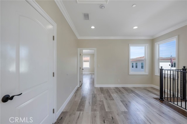 Laundry room door to left of loft.