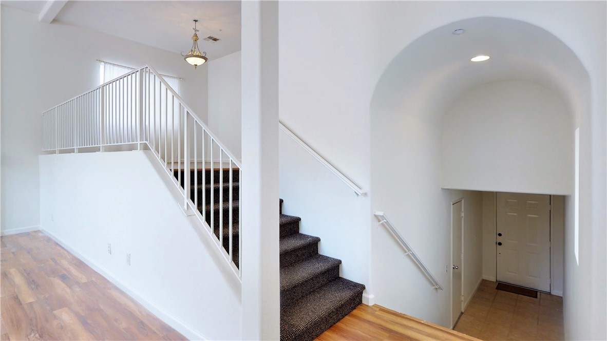 Stairs from Living Room to Dining Room and Kitchen