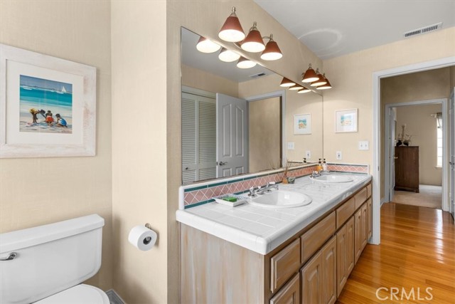 Downstairs bathroom with double sinks