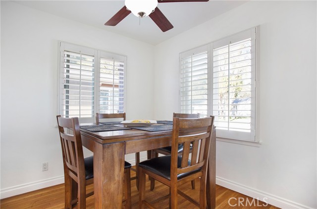 Open dining area and hardwood floors throughout