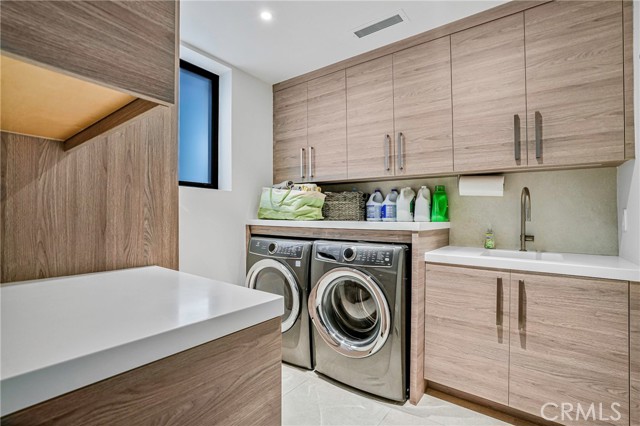 First floor (spacious) laundry room.