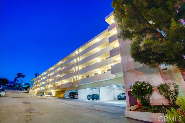 Side entrance into complex with additional parking Side entrance into complex with additional parking