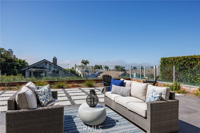 Sitting area with ocean views in backyard