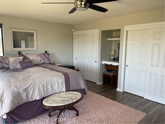 Master bedroom with plenty of storage and small