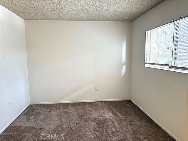 A different view of bedroom one.