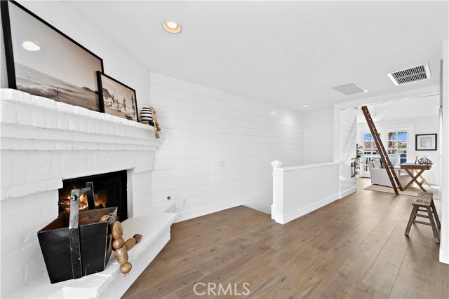 Additional view of upstairs landing that open to additional family room.
