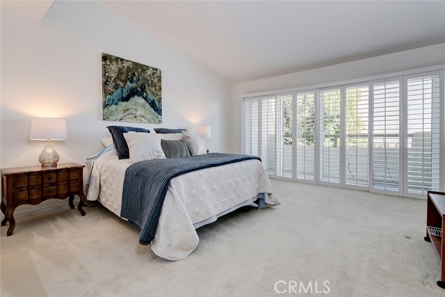 Primary bedroom has forever views!