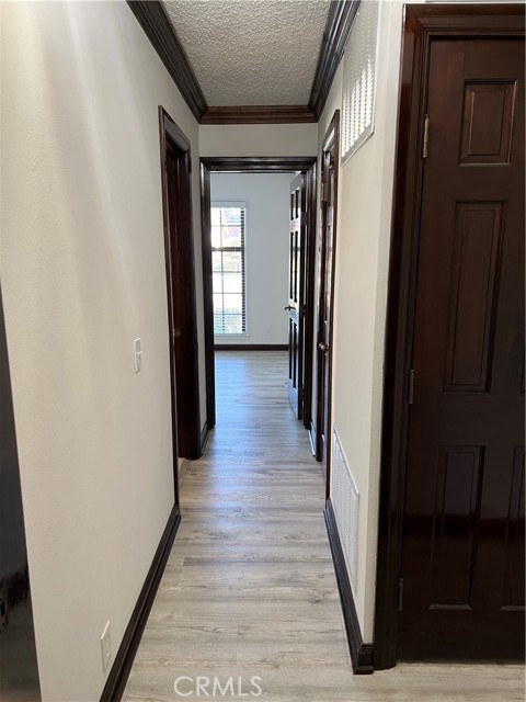 Hallway leading to downstairs hallway bath and bedroom #2