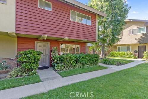 MULTIPLE OFFERS!  The seller requests all interested parties to bring their highest and best offers by Wednesday, August 30th, 12 NOON.  Tustin...'a sense of place', and that's exactly how you will feel when you step foot into this END unit townhome with the BEST location in the development!  Located in gated Tustin Villas overlooking a very large 'greenbelt' directly outside your front door!  This home boasts over 1,300 square feet of living space with 3 bedrooms, and 2.5 baths!  The living room is light and bright with a large picture window, contemporary fireplace, and tile floors.  The dining area has an updated patio slider that leads to your very own low maintenance fenced yard, breezeway patio laundry closet, and accessible 2 car garage. The updated kitchen has white shaker panel doors, quartz counters, stainless steel range, dishwasher, and sink!  All bedrooms are upstairs with a primary suite and it's own private bath along with two secondary bedrooms and a centrally located bathroom with double sinks.  Control your indoor climate remotely with your Nest thermostat! Enjoy staycation amenities such as the swimming pool and picnic area!  Near Tustin High, 9 minutes to John Wayne Airport and Irvine, less than 20 minutes to Newport Beach, and EZ access to the 405, 5 and 55!  LOW HOA!
