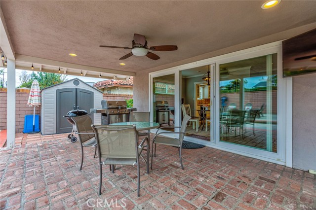 Covered patio is great for entertaining or just watching a game outside on the TV