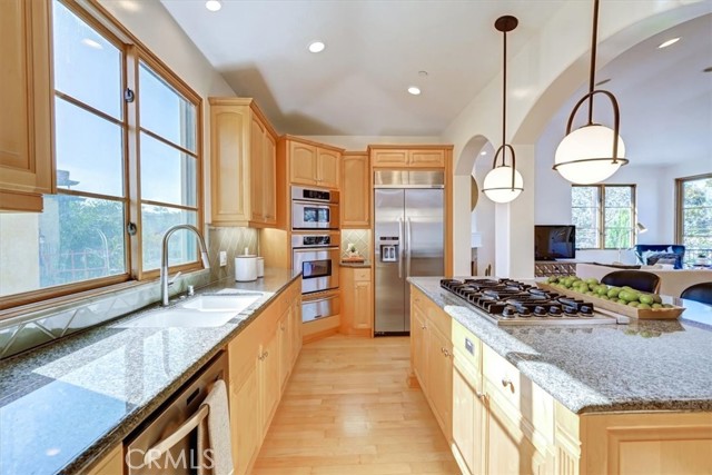 Very large kitchen with stainless steel appliances