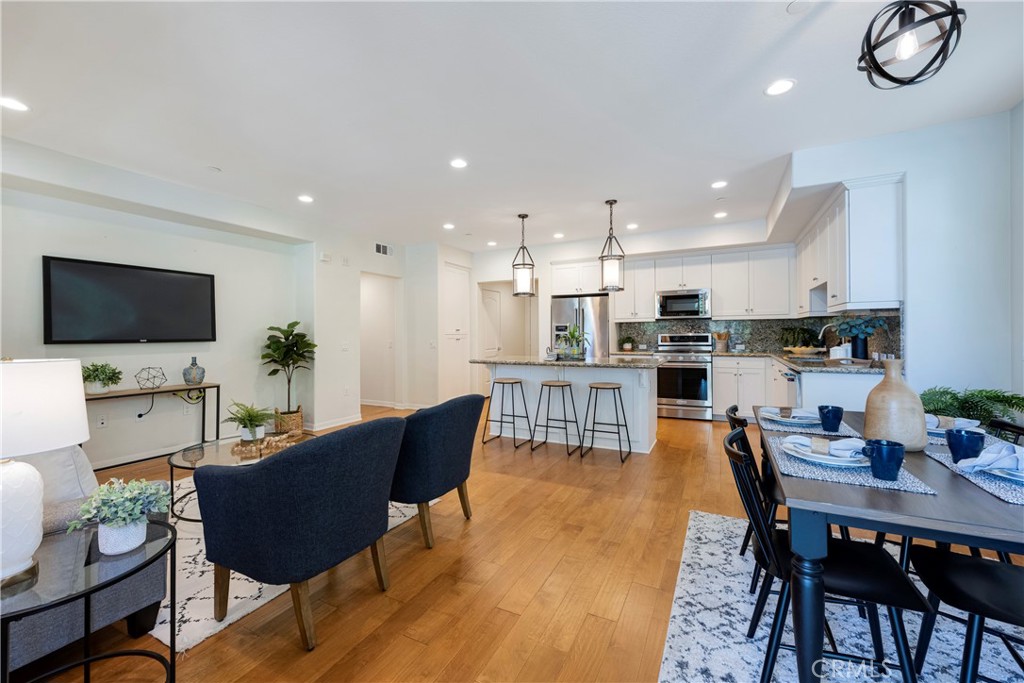 Views of the Open Floor Plan from the Balcony doorway. This home is stunning and move-in ready.