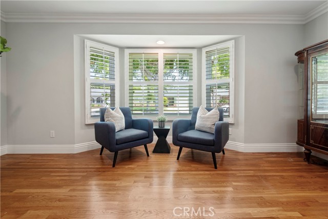 This living room is so large, there’s even room for a separate reading area. Maybe put a small game table between the two chairs and challenge someone to a game of chess?