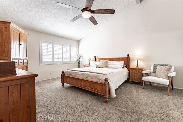 Primary suite with vaulted ceiling