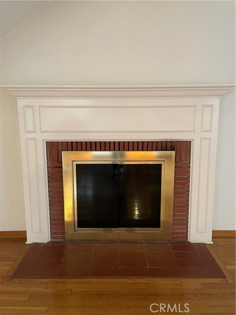 Wonderful fireplace is the focal point of the living room and visible from the kitchen as well.