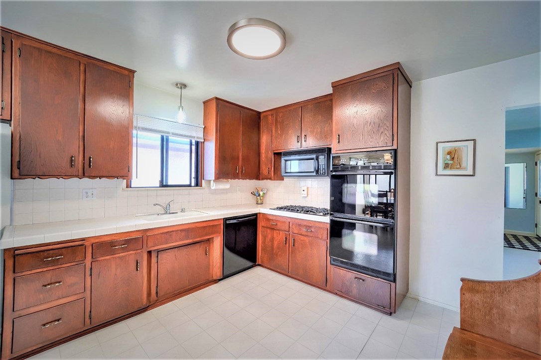The kitchen is large and open with lots of storage and counter space.