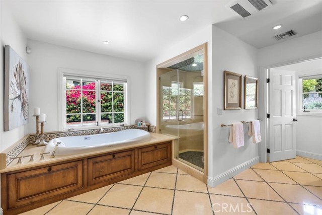 Main Bathroom with Soaking Tub, Huge Shower, Double Sinks and Private Toilet Room with Total Washlet.