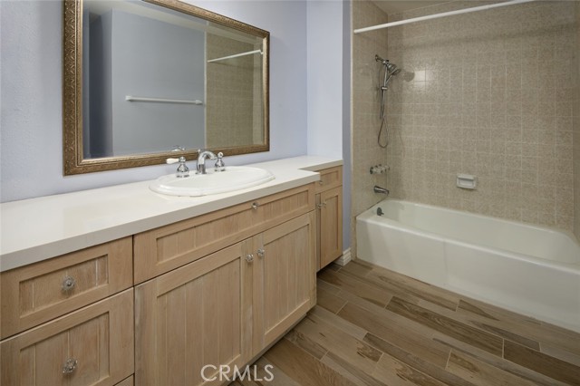 Hall bathroom with tub.