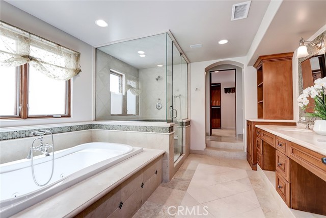 Lovely master bath with a steam shower too!