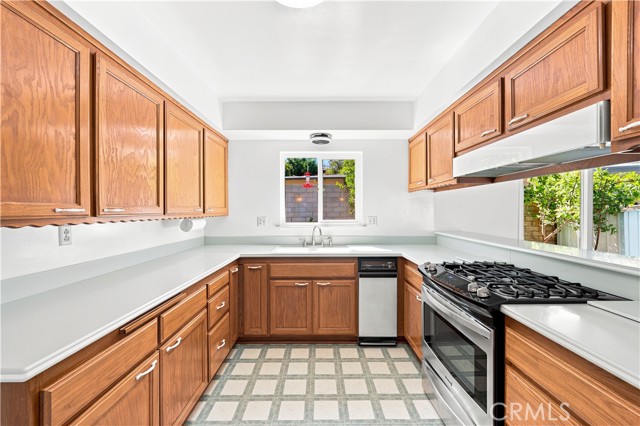 Nice clean kitchen with corian countertop ready to be used the way it is or can be remodeled to your own liking Nice clean kitchen with corian countertop ready to be used the way it is or can be remodeled to your own liking